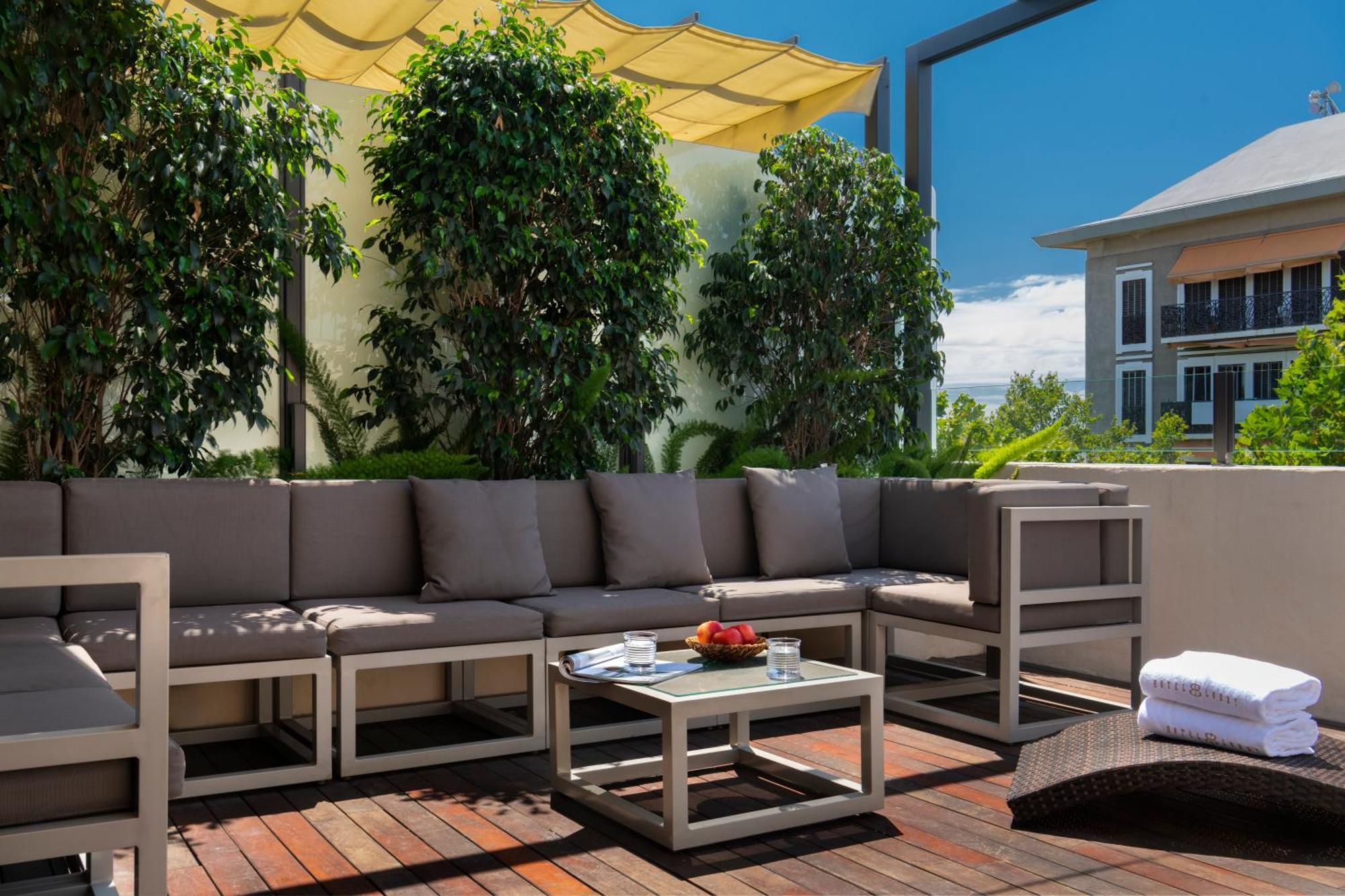 Hotel Lobby Севилья Экстерьер фото The hotel's rooftop